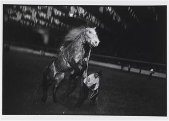 GARRY WINOGRAND (1928-1984) Castle Rock, Colorado * Bull, cowboy, rodeo clowns * Horse and two cowboys.